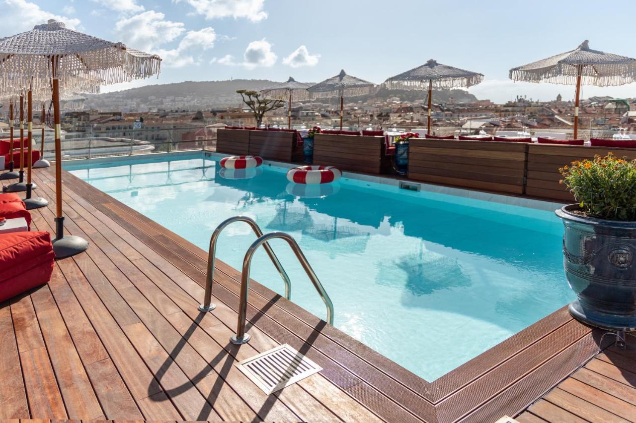 보스콜로 니스 호텔 앤 스파 외부 사진 Rooftop pool at the Hotel Grande Bretagne